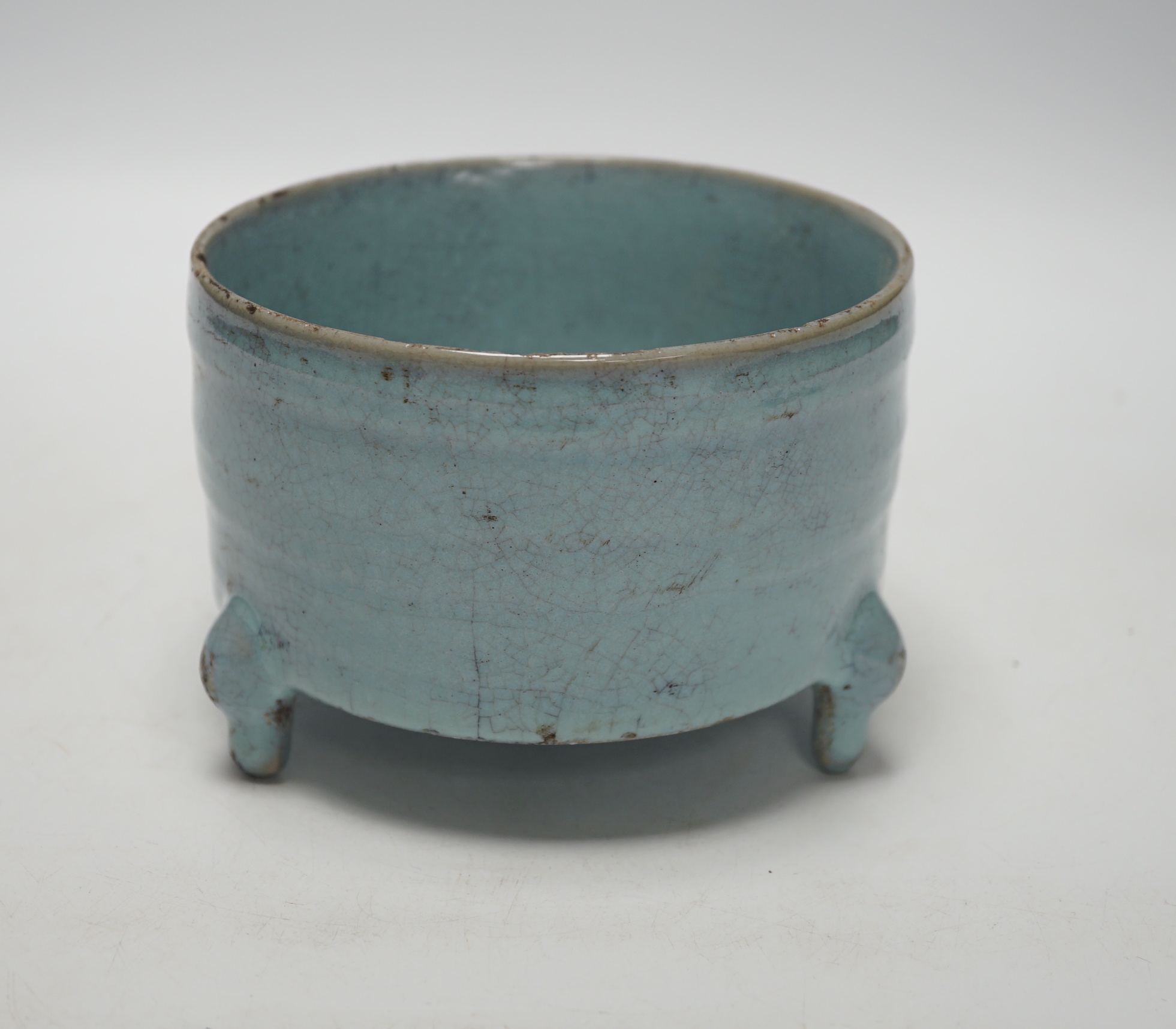 A Chinese Jun type tripod censer, 10cm tall